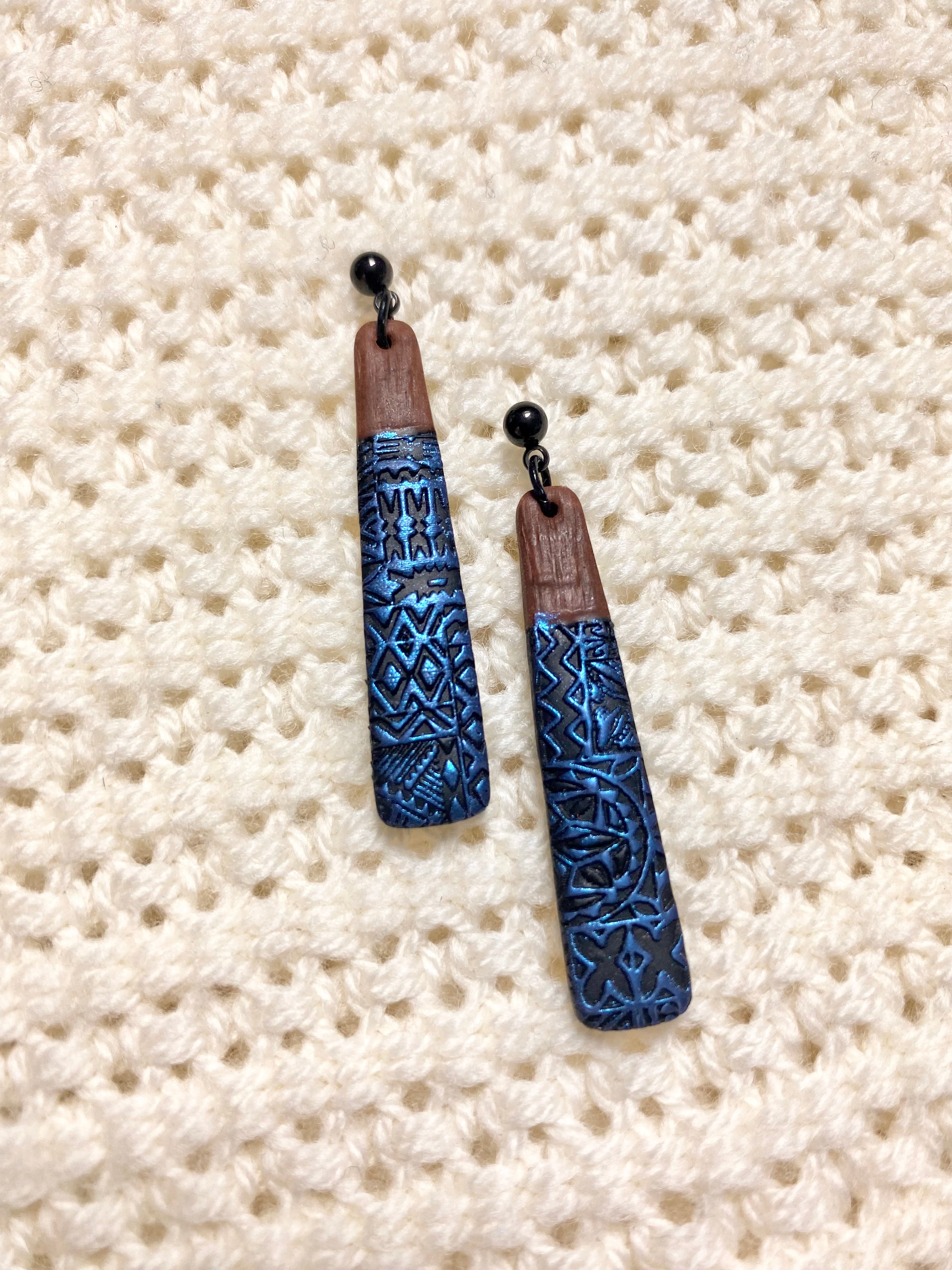 Polynesian love Earrings blue