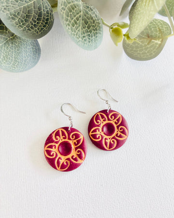 koru-inspired floral motif Earrings