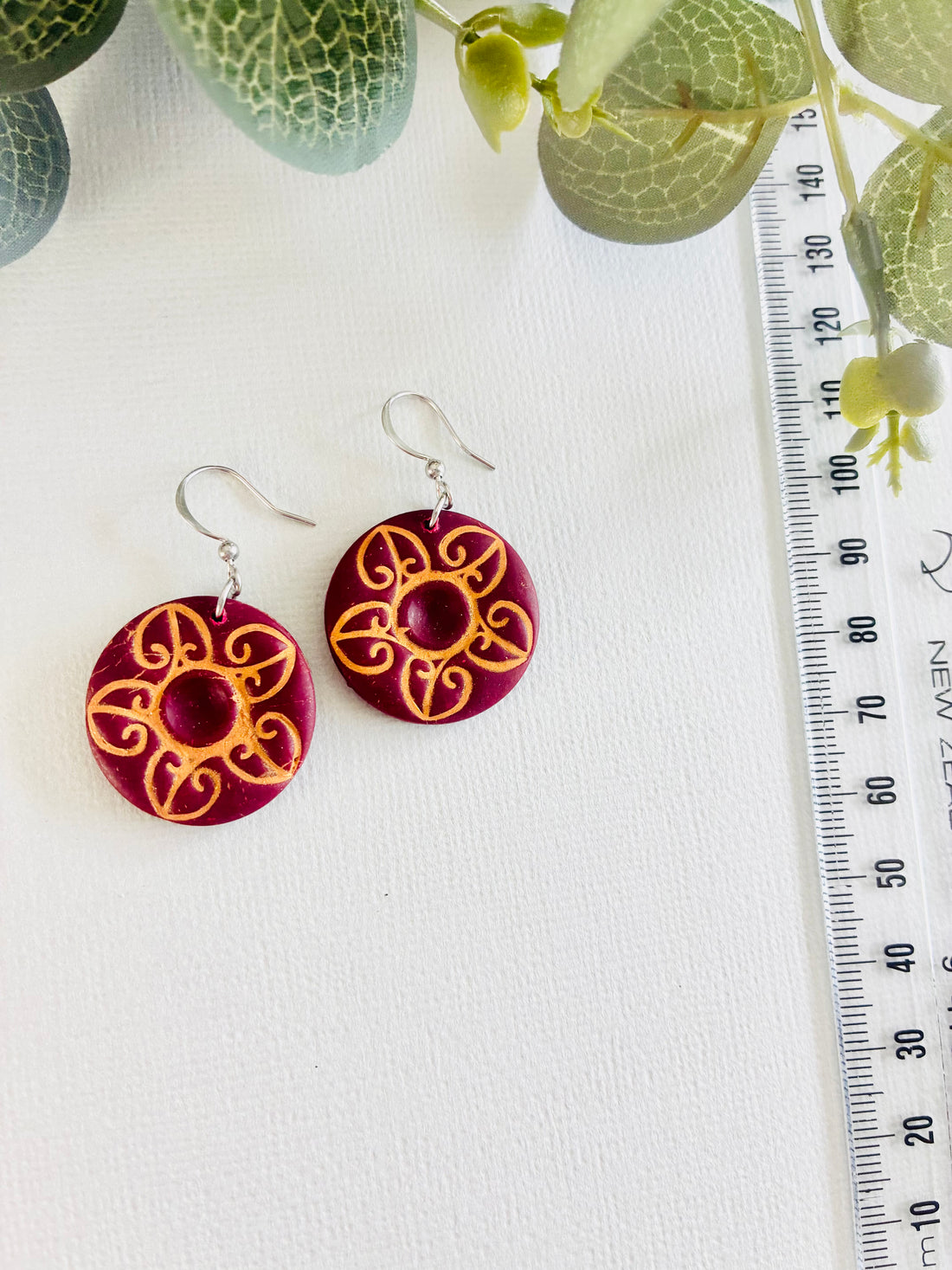 koru-inspired floral motif Earrings
