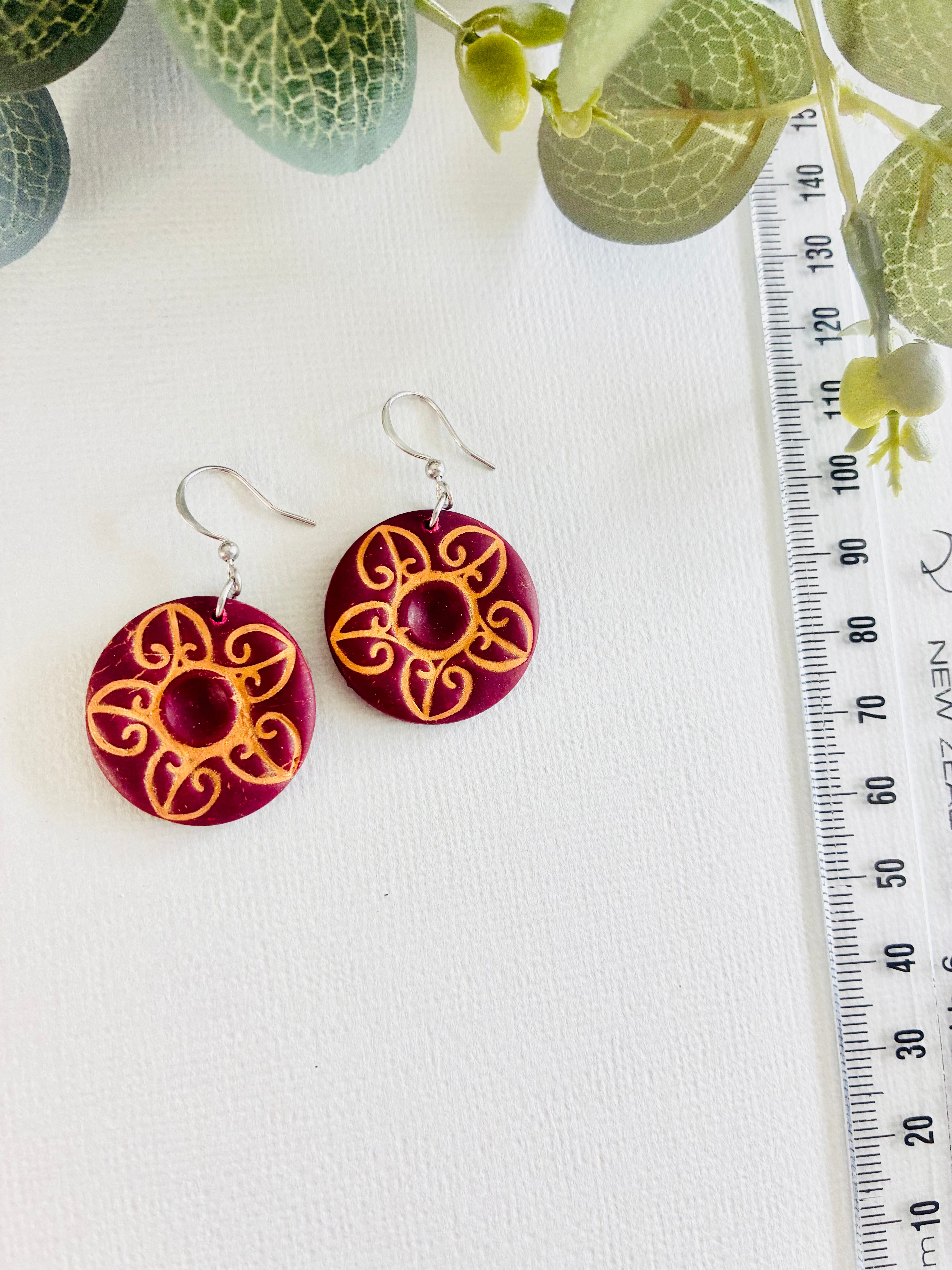 koru-inspired floral motif Earrings