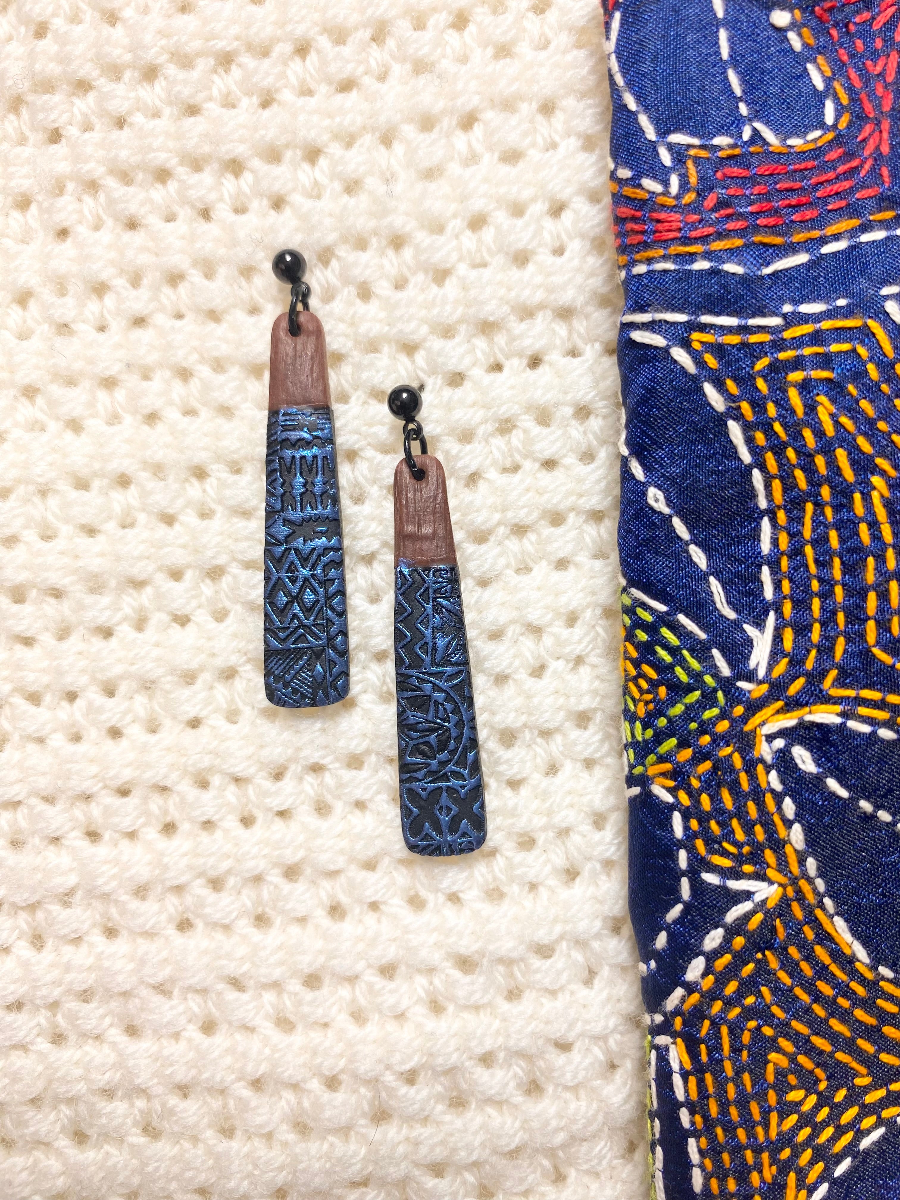 Polynesian love Earrings blue